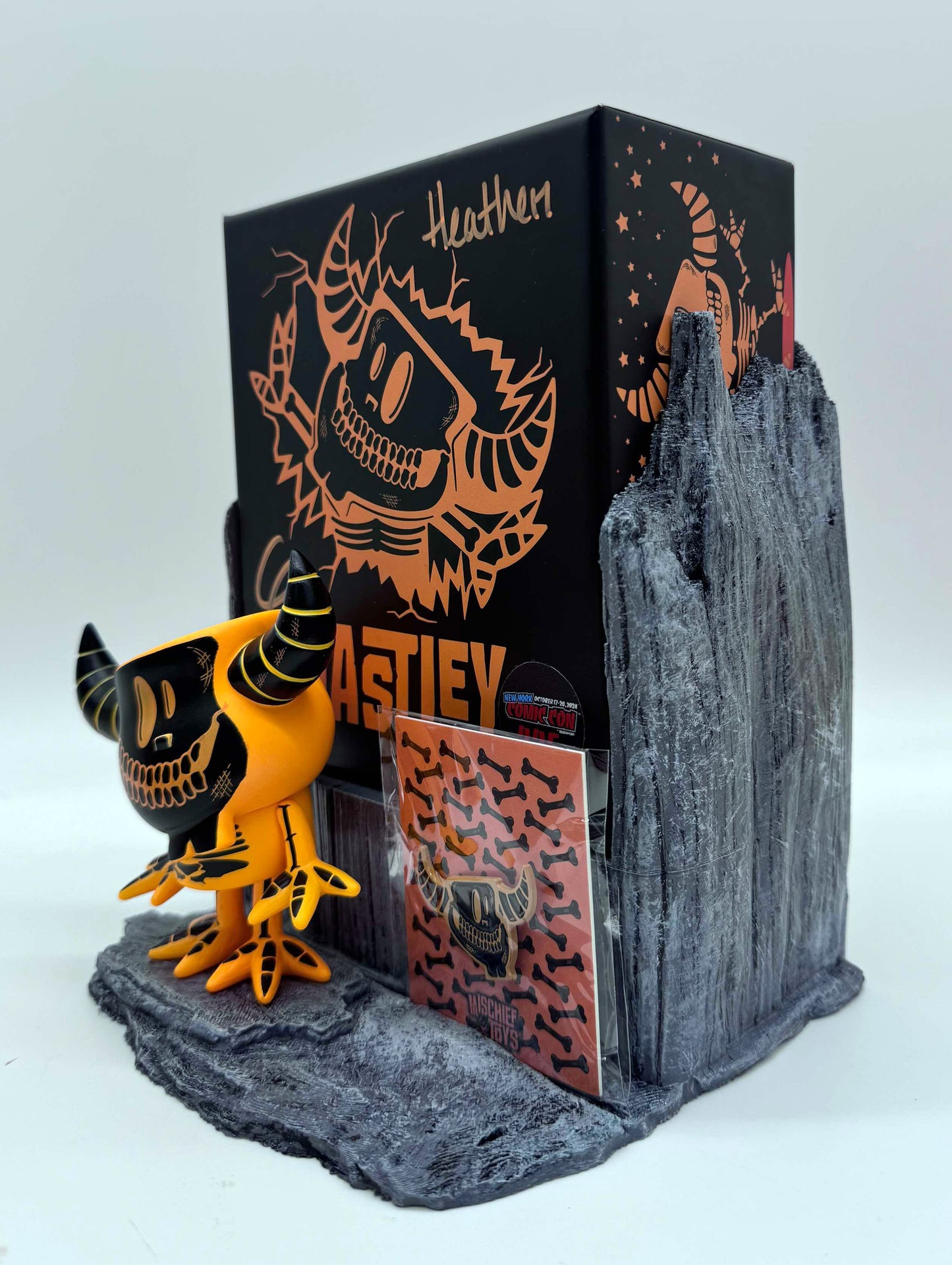 Soda Coaster® - Mischief Toys® Figure and Pin Weathered Stone Display